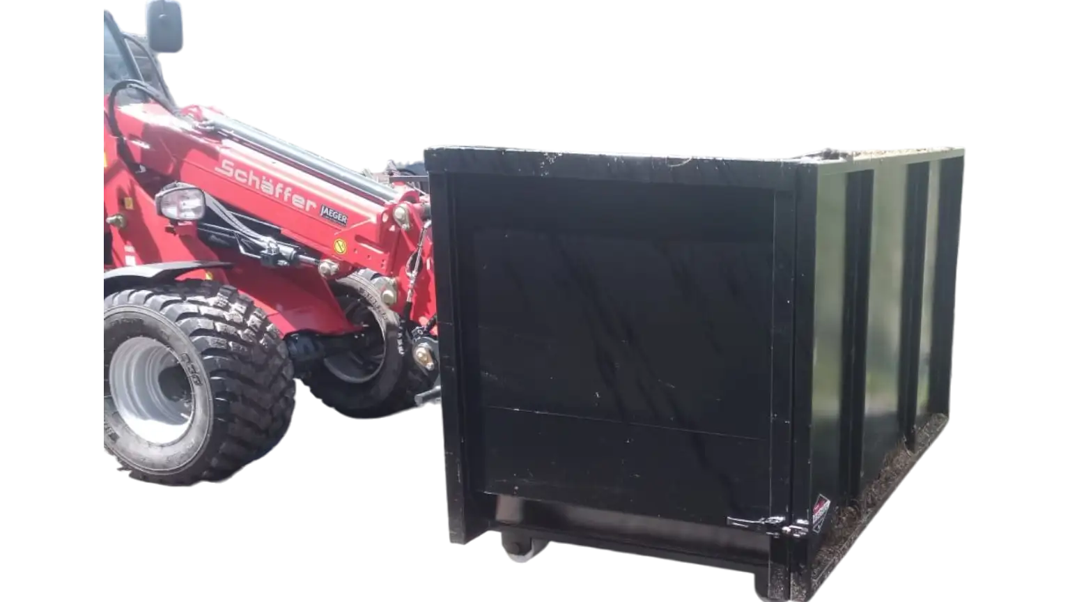 FARM-SERVANT Sammelwagen FS225SW an einem roten Schäffer-Hoflader